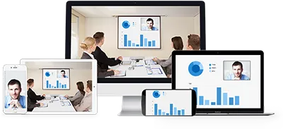 Devices display business meeting footage, blue bar charts, and video-call portraits across monitors, a laptop, tablet, and smartphone.