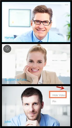 Video call interface displays three stacked portraits of smiling adults, with name labels and a small options menu open beside the bottom portrait.