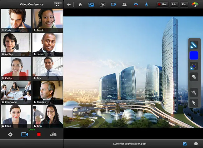 Interface displays portrait video participants beside a futuristic skyscraper complex, with presentation and call controls.
