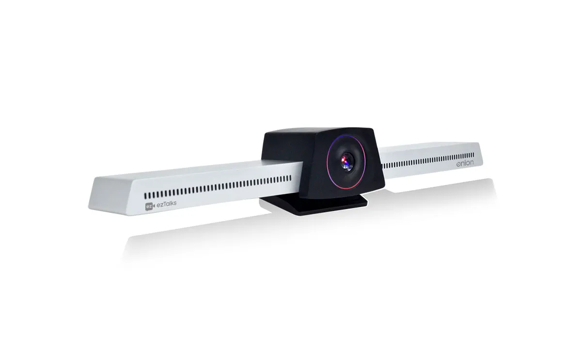 Video conferencing camera with a central black lens and two white horizontal speaker bars on a white background.