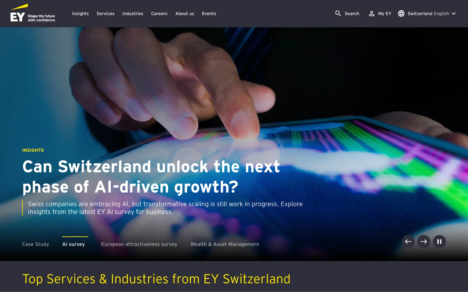 Hand touches a glowing colorful tablet beneath a dark EY website header and AI survey headline.